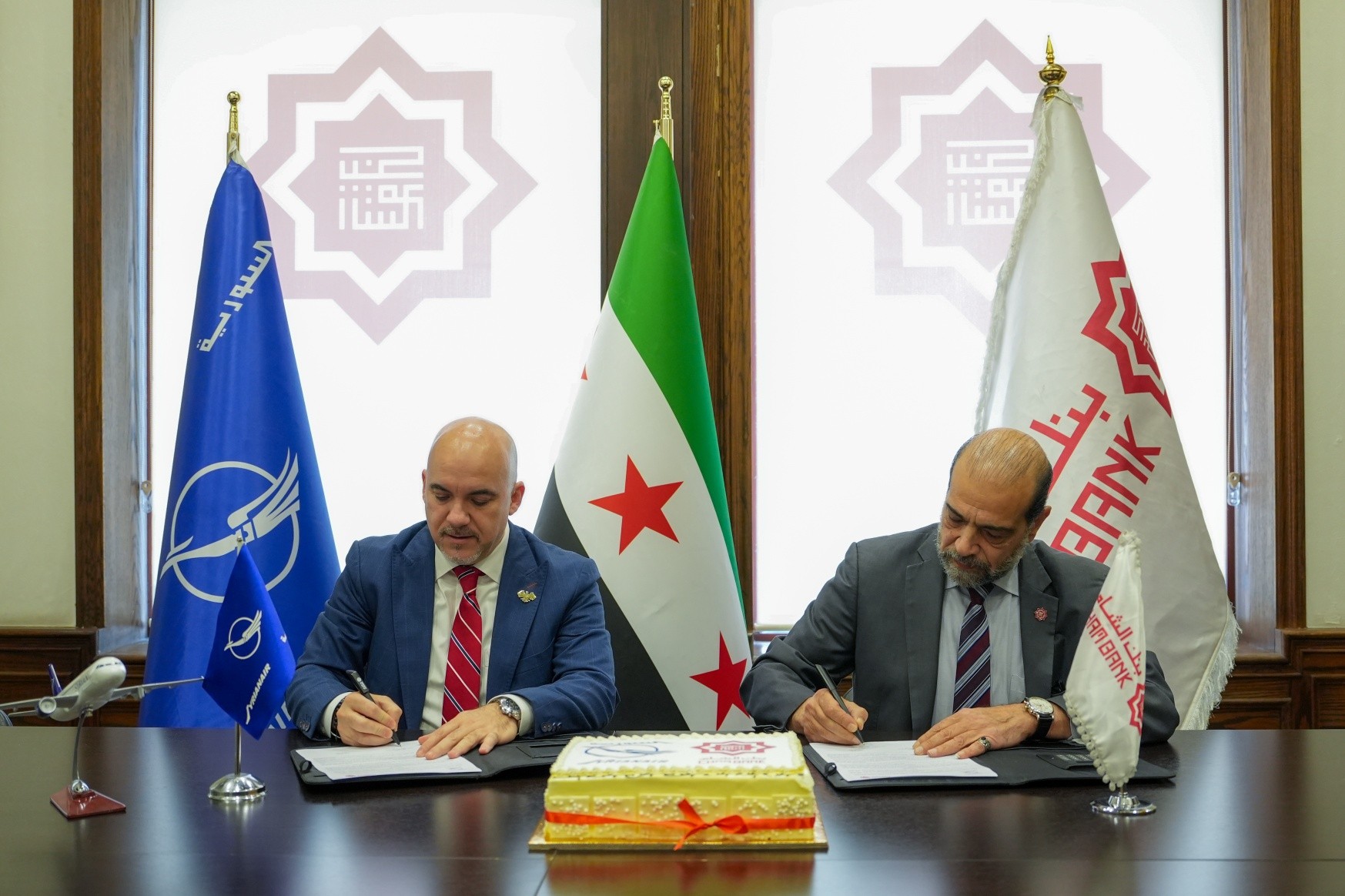 The Syrian Aviation Holding Company signs a cooperation agreement with Cham Bank
